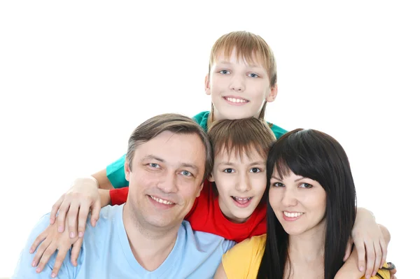Familie in gekleurde t-shirts — Stockfoto