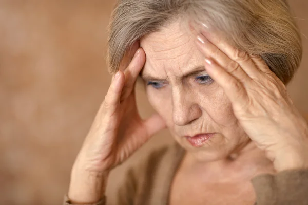 Žena s bolestí hlavy — Stock fotografie