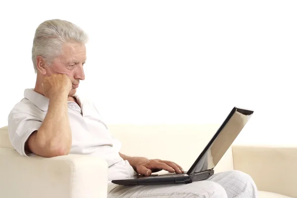 Mature man relaxing at home — Stock Photo, Image