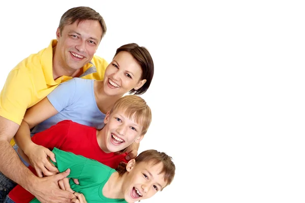 Attractive family in bright T-shirts — Stock Photo, Image