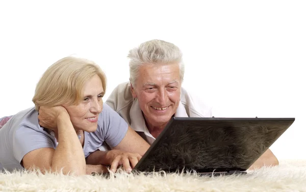 Mature couple relaxing at home — Stock Photo, Image