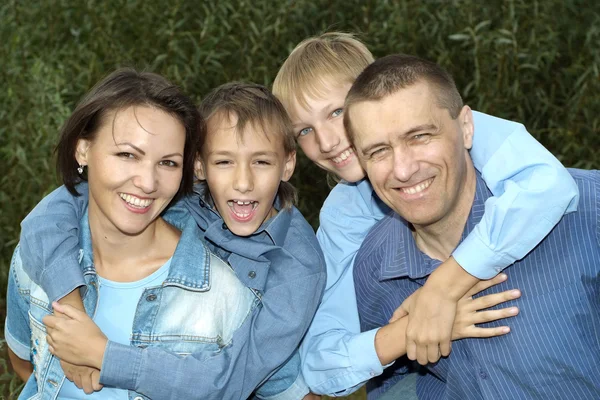 Nice family posing outdoors — Stock Photo, Image