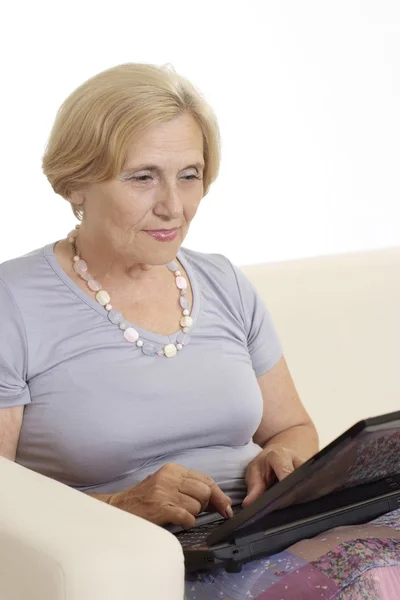 Mature woman relaxing at home — Stock Photo, Image