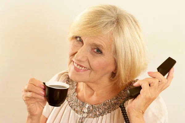 Mulher com um telefone — Fotografia de Stock