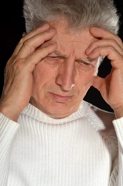 Elderly man thinking — Stock Photo, Image