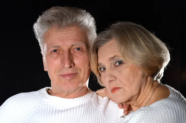 Elderly couple embracing — Stock Photo, Image