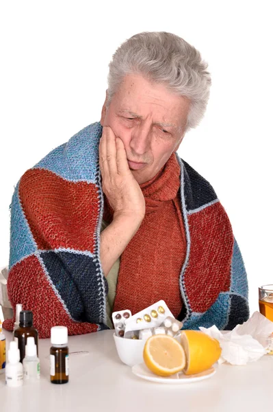 Elderly caucasian man treated by medicines — Stock Photo, Image