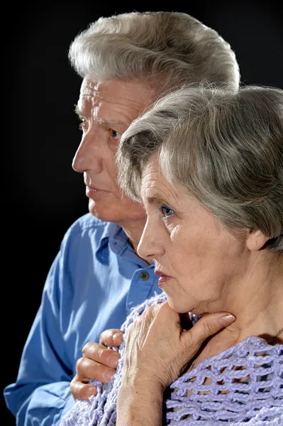 Elderly couple embracing — Stock Photo, Image