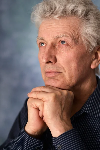 stock image thinking older man