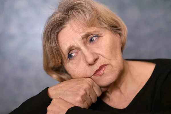 Portrait of melancholy older woman — Stock Photo, Image