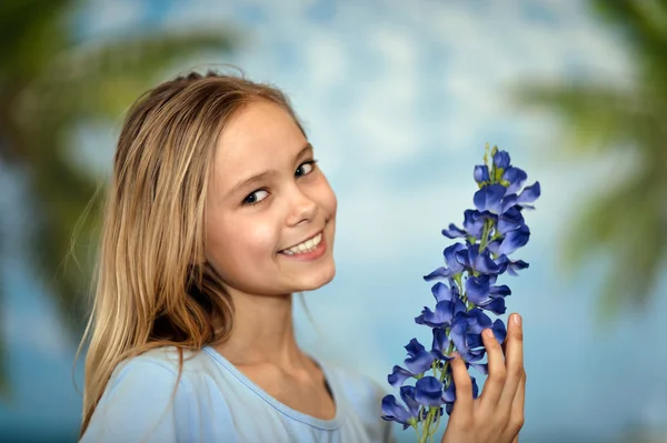 Cheerful girl in a blue shirt — Stock Photo, Image