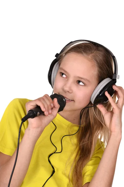 Girl in the yellow shirt singing — Stock Photo, Image