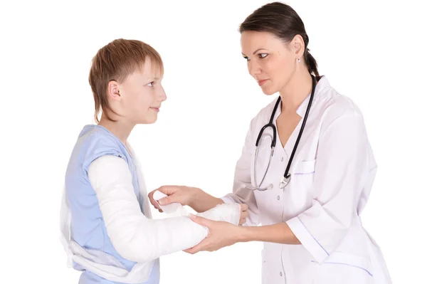 Portrait of nurse and boy with a broken arm — Stock Photo, Image