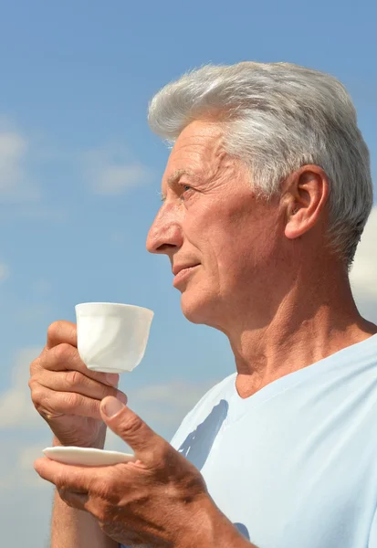 Beautiful Caucasian aged man in nature — Stock Photo, Image