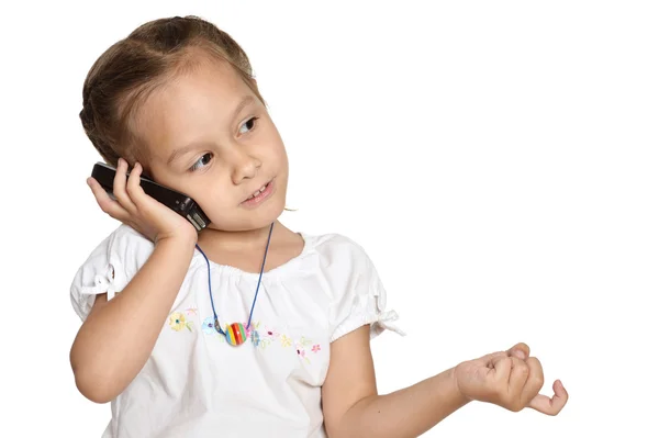 Kleines Mädchen telefoniert isoliert auf weißem Hintergrund — Stockfoto