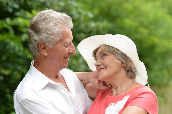 Happy elderly couple at nature — Stock Photo, Image
