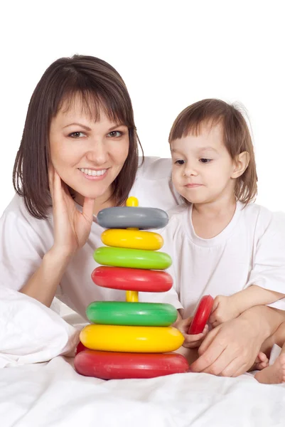 Portrait of a cute mom and daughter playing — Stock Photo, Image