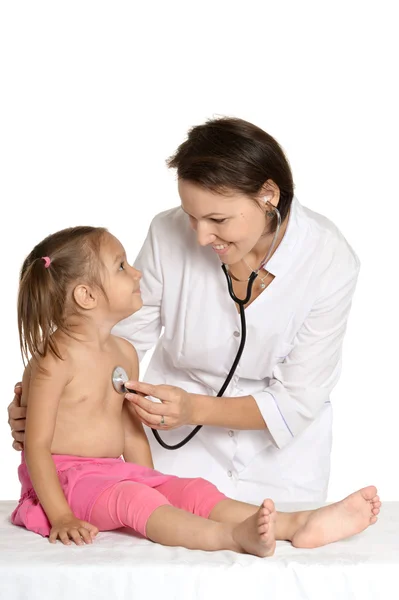Little girl visiting the pediatrician Stock Image
