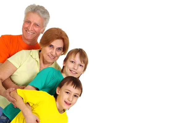 Família feliz em camisetas brilhantes — Fotografia de Stock