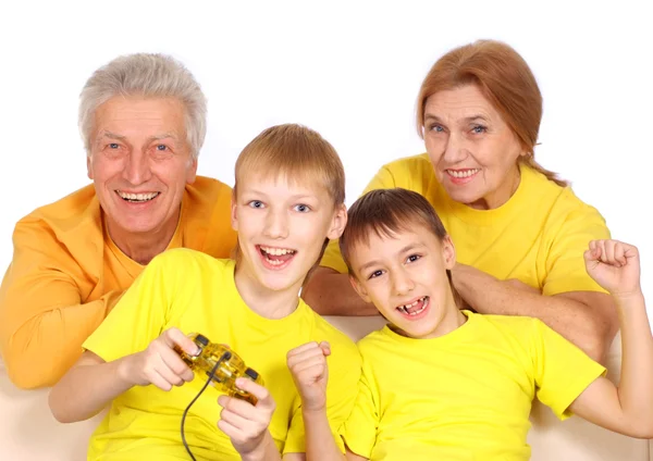 Beautiful family in yellow t-shirts — Stock Photo, Image