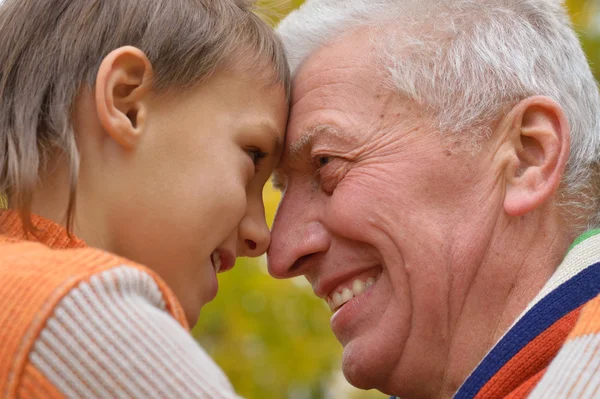 Nice old man with her kid — Stock Photo, Image