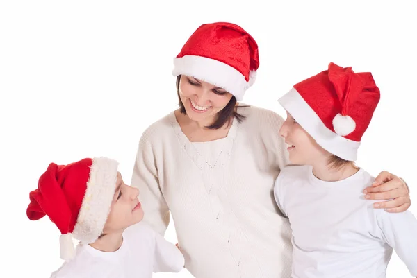 Família em chapéus de santa — Fotografia de Stock