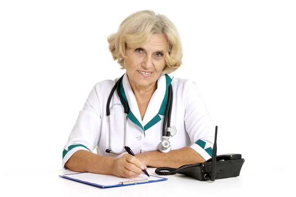 Escrita enfermeira agradável — Fotografia de Stock