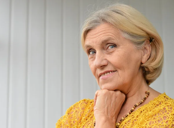 Older woman in a room — Stock Photo, Image