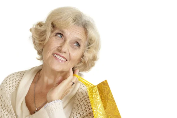 Roztomilý starší žena s nákupy — Stock fotografie