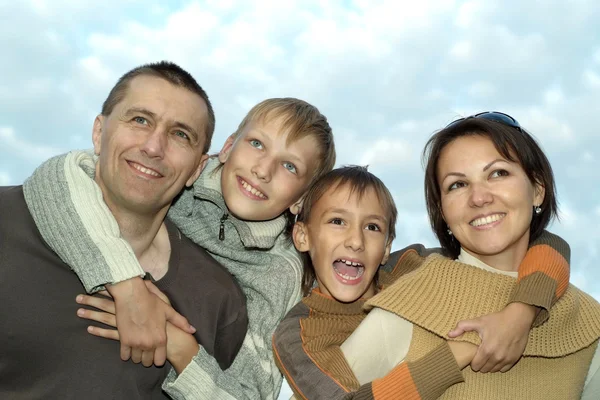 Happy parents and boys — Stock Photo, Image