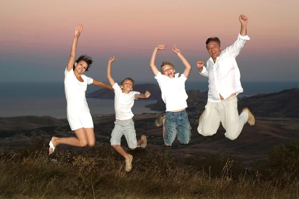 Jumping people together — Stock Photo, Image