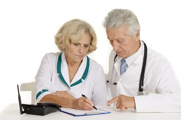 Médicos con una bata blanca —  Fotos de Stock