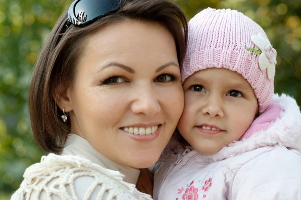 Portrait of a beautiful mother and girl — Stock Photo, Image