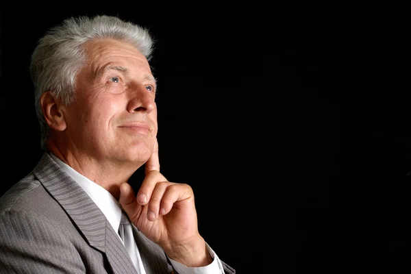 Serious old man in suit — Stock Photo, Image