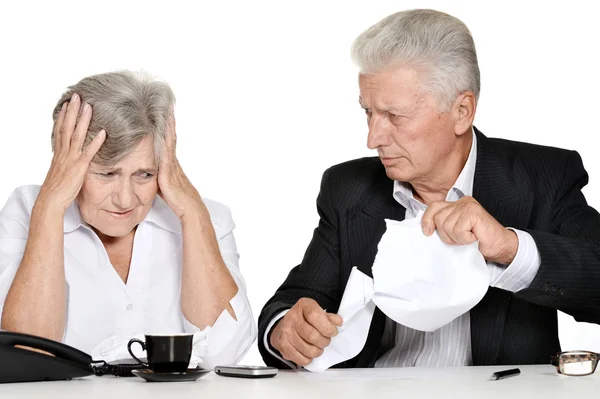 Older stressed couple in the workplace — Stock Photo, Image