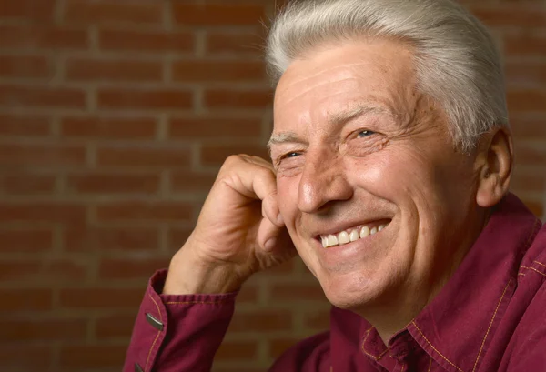 Elderly man in a shirt — Stock Photo, Image