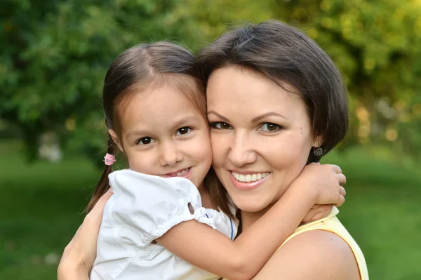 Little cute girl with her mother — Stock Photo, Image