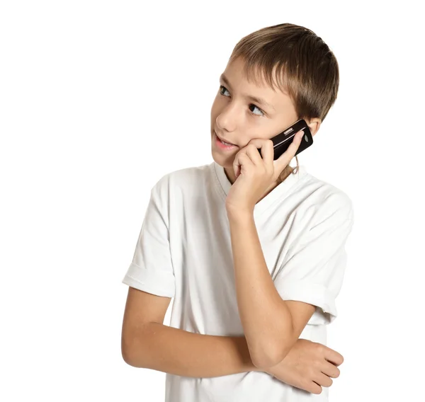 Portrait of a teenage boy speaking cellphone — Stock Photo, Image