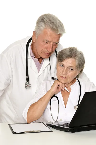 Médicos em um casaco branco — Fotografia de Stock