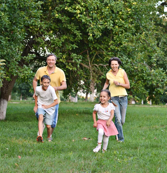 Happy family on nature — Stock Photo, Image