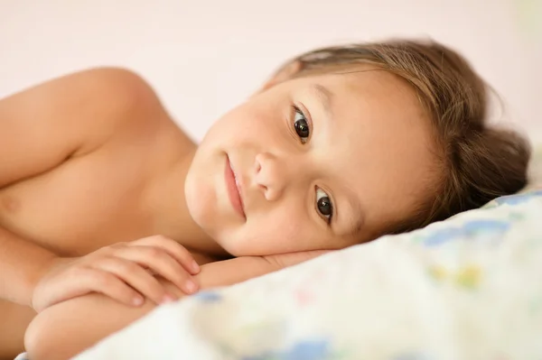 Girl in her bed — Stock Photo, Image