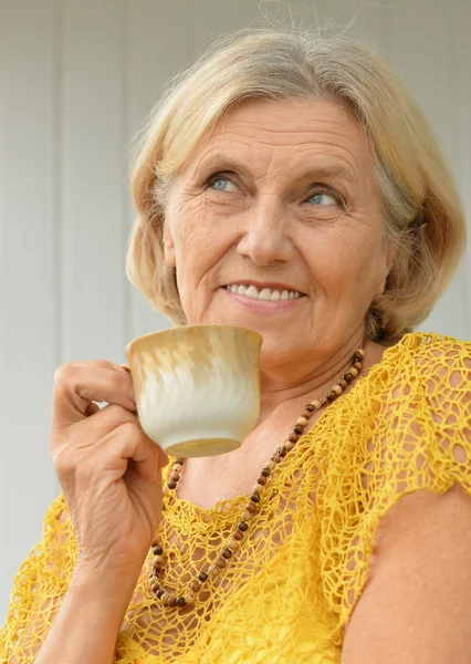 Portrait of a caucasian elderly woman at home — Stock Photo, Image