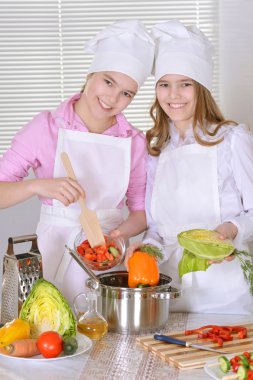 Two cheerful teen girls