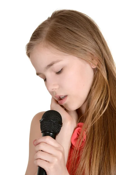 Chica cantando sobre un fondo blanco — Foto de Stock