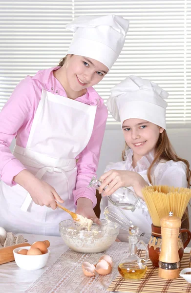 Young girls cook — Stock Photo, Image