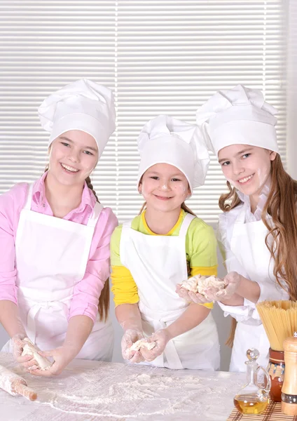 Cheerful girls cook — Stock Photo, Image
