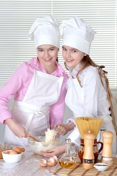 Young girls cook — Stock Photo, Image
