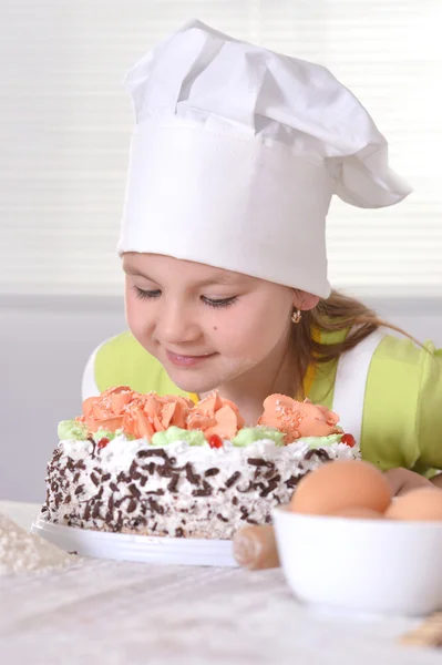 Kleines Mädchen mit Kochmütze — Stockfoto