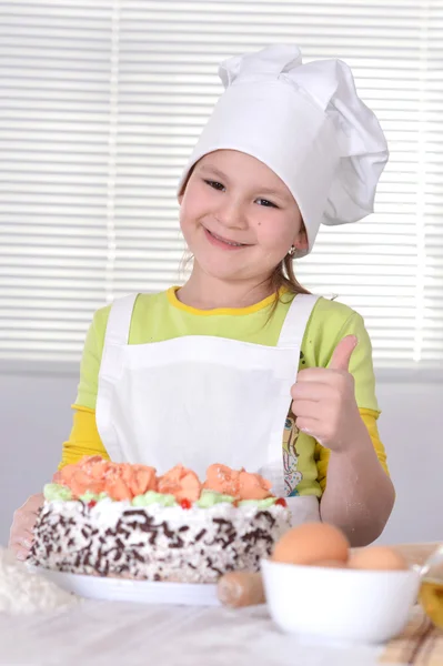 Mała dziewczynka kapelusz kucharz — Zdjęcie stockowe