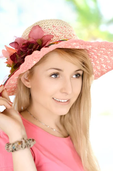 Girl in a pink hat — Stock Photo, Image